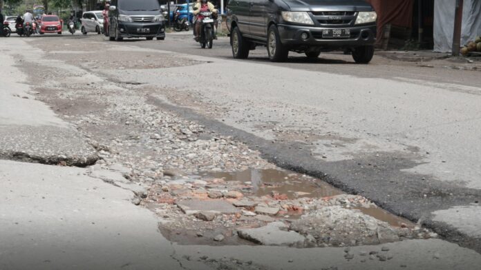 jalan rusak riau